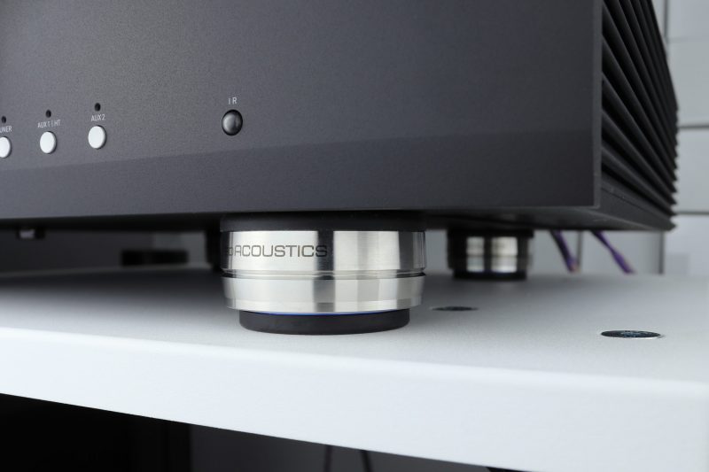 IsoAcoustics OREA being used underneath a speaker