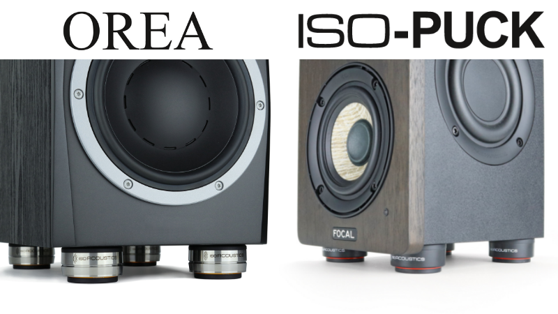 OREA underneath a speaker next to ISO-PUCK underneath another speaker